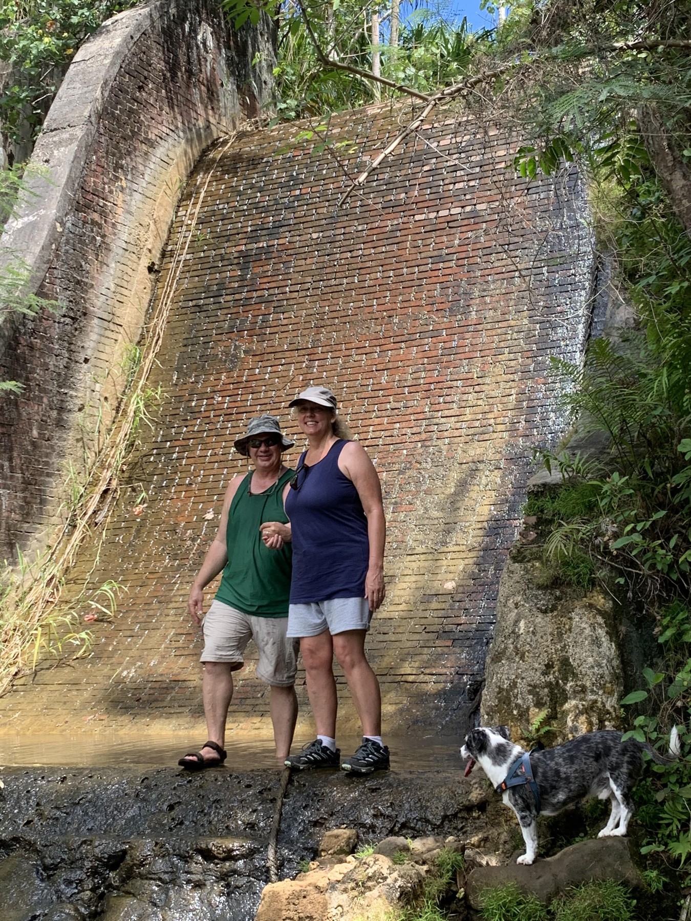 Greg and Sheri on a forest hike beside an old dam on Guam